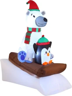 6ft Inflatable LED Polar Bear Sledding With A Penguin -Christmas Decorations 6ft Inflatable LED Polar Bear Sledding with a Penguin 2 result 600x799 1